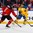 BUFFALO, NEW YORK - JANUARY 5: Sweden's Elias Pettersson #14 controls the puck against Canada's Dante Fabbro #8 during the gold medal game of the 2018 IIHF World Junior Championship. (Photo by Andrea Cardin/HHOF-IIHF Images)

